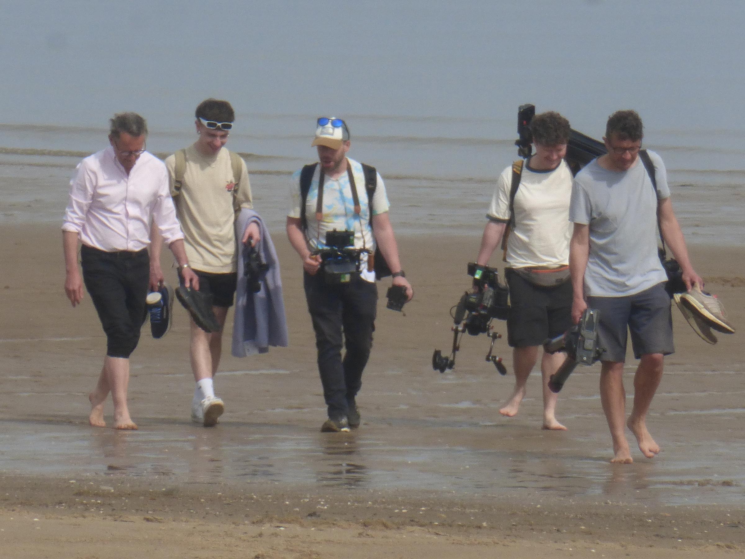 Michael Mosley seen alongside wife Clare and others, including a camera crew, at Colwyn Bay, north Wales, on May 10 — just weeks before his disappearance in Symi, Greece. Release date June 10 2024. Pictures have surfaced of TV presenter Michael