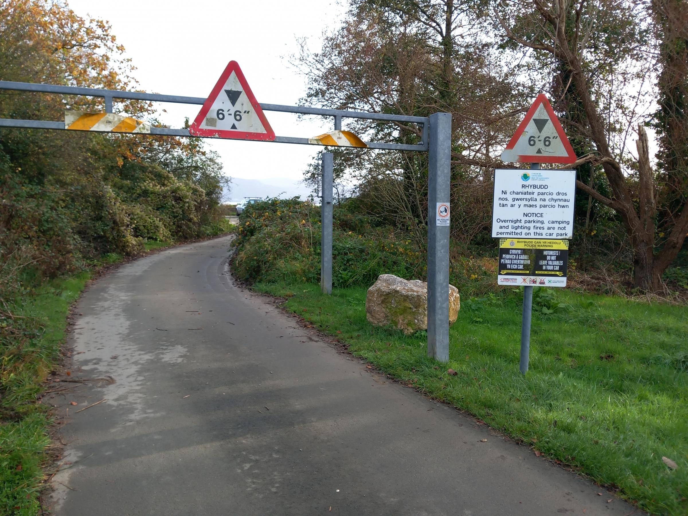 Large boulder placed by Anglesey council at the entrance to the Lleiniog car park designed to stop vehicles driving around the height barrier (Image Dale Spridgeon)